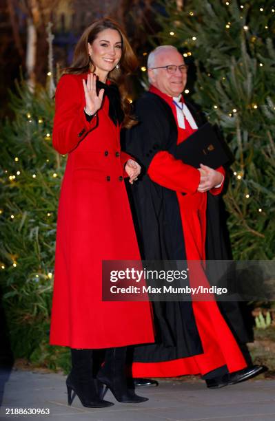 Catherine, Princess of Wales, accompanied by The Very Reverend Dr David Hoyle, Dean of Westminster, attends the 'Together At Christmas' Carol Service...