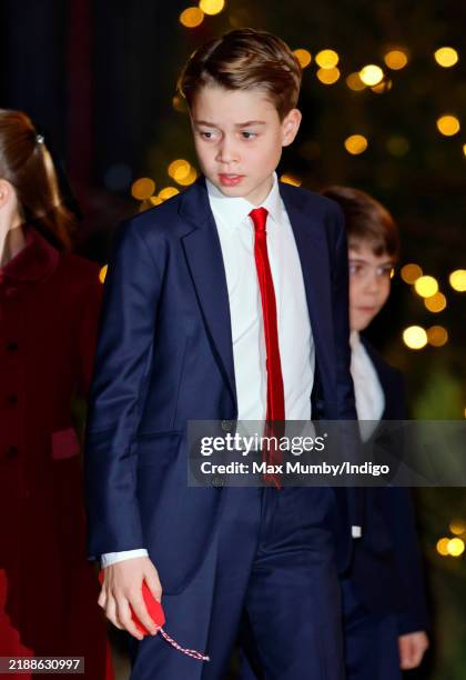 Prince George of Wales attends the 'Together At Christmas' Carol Service at Westminster Abbey on December 6, 2024 in London, England. Spearheaded by...