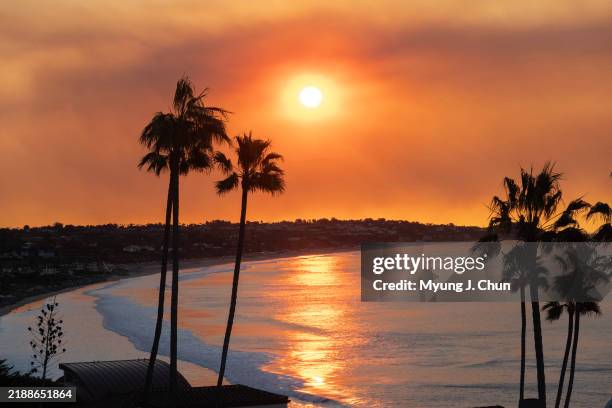 Smoke from the Franklin fire creates a colorful sunrise in Malibu, CA on Tuesday, Dec. 10, 2024.