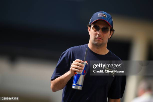 Sergio Perez of Mexico and Oracle Red Bull Racing walks in the Paddock prior to final practice ahead of the F1 Grand Prix of Abu Dhabi at Yas Marina...