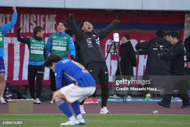 Coach, Takashi Kiyama of Fagiano Okayama celebrates the win during the J.LEAGUE J1 Promotion Play-Offs Final between Fagiano Okayama and Vegalta...
