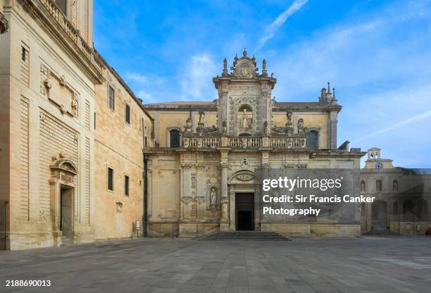 baroque facade of "duomo di lecce" aka "cathedral of saint mary of the assumption and saint orontius" in lecce, puglia, italy - lecce stock pictures, royalty-free photos & images