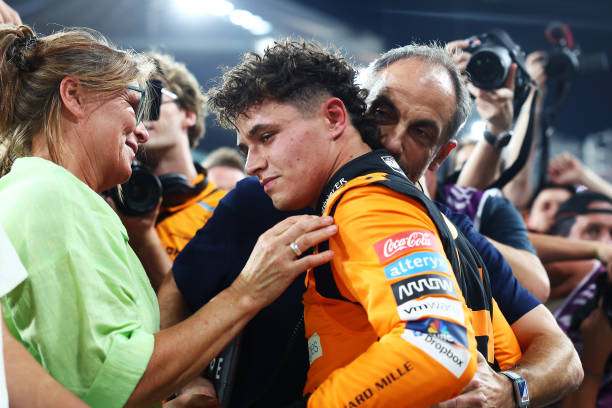 Pole position qualifier Lando Norris of Great Britain and McLaren celebrates with father Adam Norris during qualifying ahead of the F1 Grand Prix of...