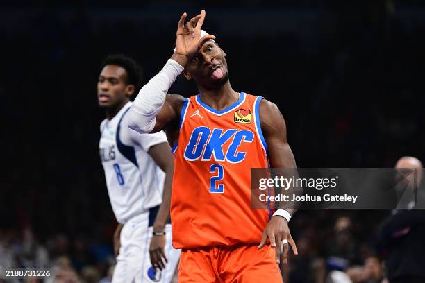 Shai Gilgeous-Alexander of the Oklahoma City Thunder celebrates a made basket during the first half against the Dallas Mavericks at Paycom Center on...