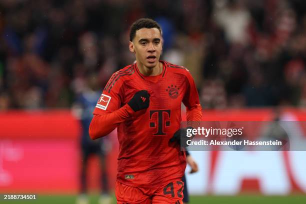 Jamal Musiala of Bayern Munich celebrates scoring his team's 3rd goal during the Bundesliga match between FC Bayern München and 1. FC Heidenheim 1846...