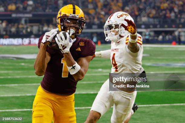 Xavier Guillory of the Arizona State Sun Devils catches a touchdown pass against Jeremiah Cooper of the Iowa State Cyclones during the third quarter...