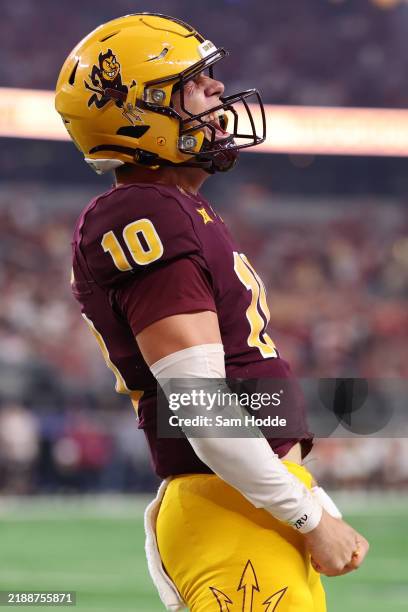 Sam Leavitt of the Arizona State Sun Devils celebrates after his touchdown pass against the Iowa State Cyclones during the third quarter of the Big...