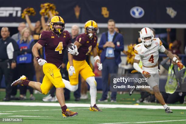 Cam Skattebo of the Arizona State Sun Devils scores a receiving touchdown against the Iowa State Cyclones during the third quarter of the Big 12...