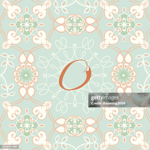 elegant calligraphic, ribbon-like, uniquely designed letter 'o' monogram vector logo, encircled by a festival winter-themed floral border - wedding border stock illustrations