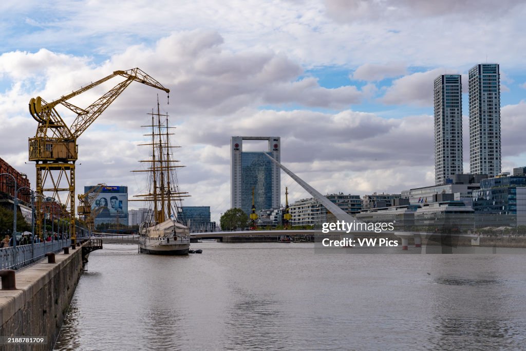 Dock 3 with the Woman's Bridge, ARA Presidente Sarmiento & skyline of Puerto Madero, Buenos Aires, Argentina