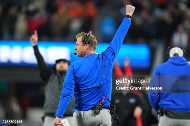 Rhett Lashlee of the SMU Mustangs reacts during the fourth quarter of the 2024 ACC Football Championship at Bank of America Stadium on December 07,...