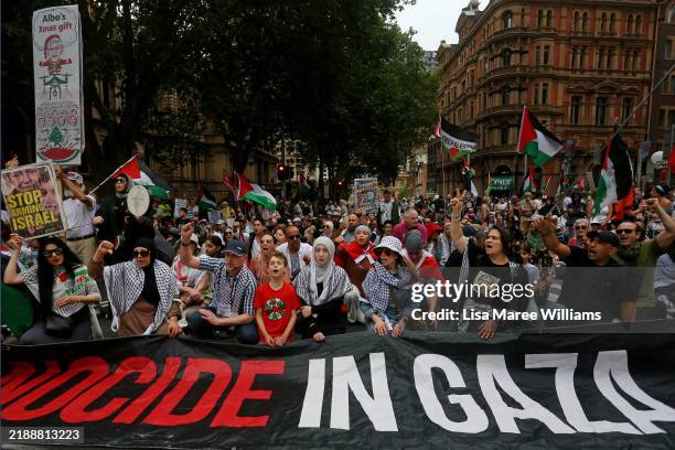 Pro-Palestine protesters rally in the central business district on December 08, 2024 in Sydney, Australia. Australia has shifted its stance by voting...