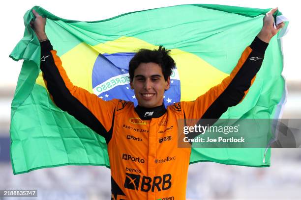 Drivers Champion Gabriel Bortoleto of Brazil and Invicta Racing celebrates in parc ferme during the Round 14 Yas Island Feature race of the Formula 2...
