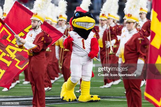 The Iowa State Cyclones mascot waves a flag during pregame during the Big 12 championship football game between the Arizona State Sun Devils and the...