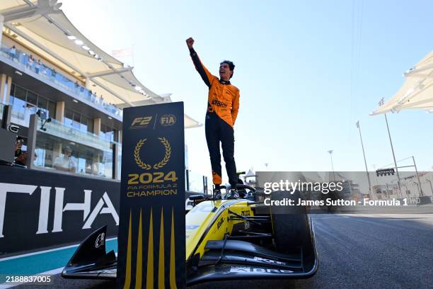 Drivers Champion Gabriel Bortoleto of Brazil and Invicta Racing celebrates in parc ferme during the Round 14 Yas Island Feature race of the Formula 2...