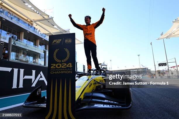 Drivers Champion Gabriel Bortoleto of Brazil and Invicta Racing celebrates in parc ferme during the Round 14 Yas Island Feature race of the Formula 2...