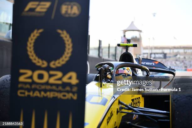 Drivers Champion Gabriel Bortoleto of Brazil and Invicta Racing celebrates in parc ferme during the Round 14 Yas Island Feature race of the Formula 2...