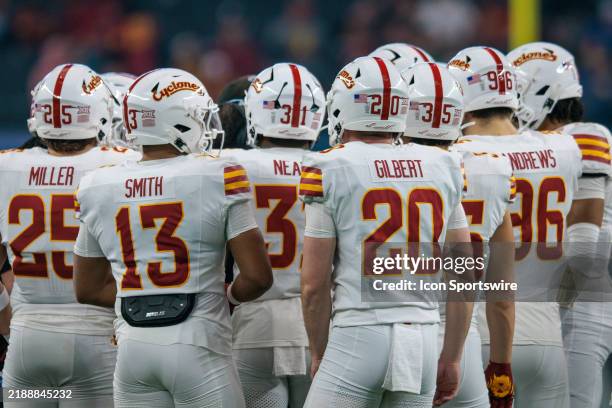 Iowa State Cyclones huddle during the Big 12 Championship game against the Arizona State Sun Devils on December 7th, 2024 at ATT Stadium in Arlington...