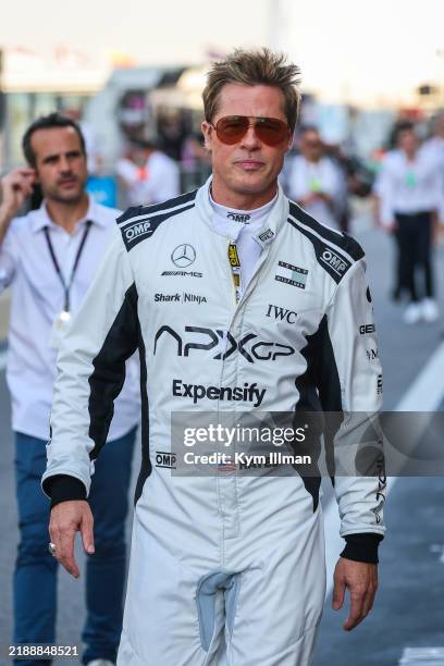 Actor Brad Pitt walks in pit lane during the F1 Grand Prix of Abu Dhabi at Yas Marina Circuit on December 8, 2024 in Abu Dhabi, United Arab Emirates.