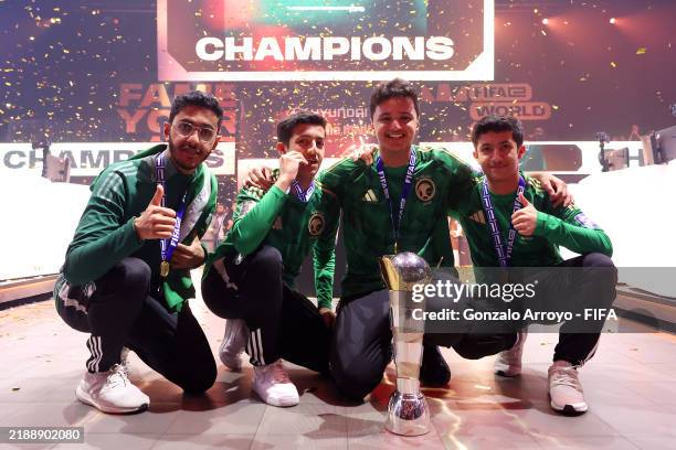 Team Saudi Arabia pose for a photo with the trophy after being crowned champions following victory against Team France in the Final match on Day 4 of...