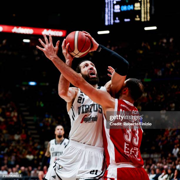 Tornike Shengelia of Virtus Segafredo Bologna and Nikola Mirotic of EA7 Emporio Armani Milan in action during the LBA Lega Basket Serie A Round 10...