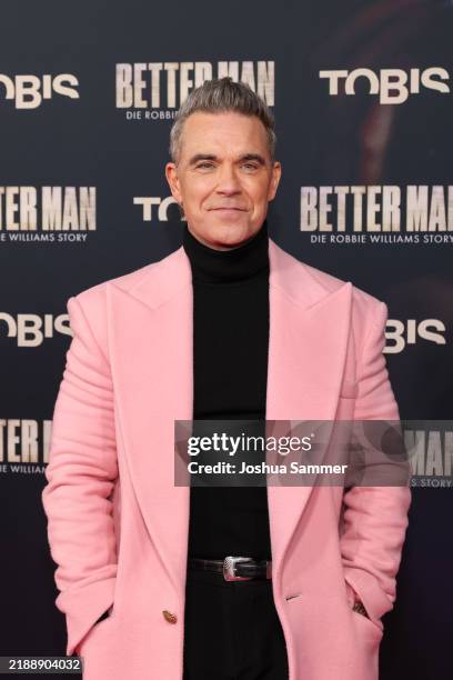 Robbie Williams attends the premiere of "Better Man - Die Robbie Williams Story" at Cinedom on December 08, 2024 in Cologne, Germany.