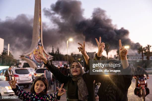 Anti-Assad citizens in Damascus celebrate after Assad fled the country and Damascus was taken over by the National Syria Army on December 8, 2024 in...
