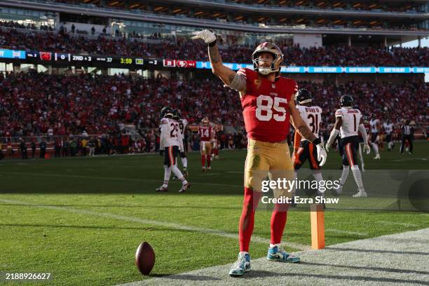 George Kittle of the San Francisco 49ers reacts after a first down during the second quarter against the Chicago Bears at Levi's Stadium on December...
