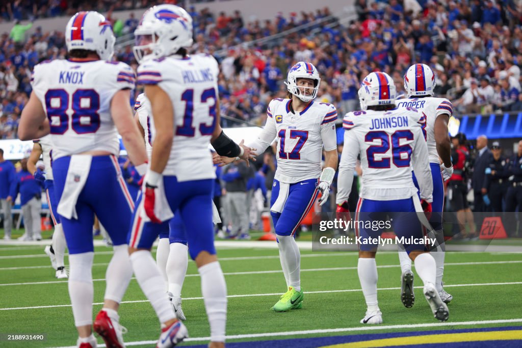 Josh Allen Rams Josh Allen of the Buffalo Bills celebrates with teammates after... News ...