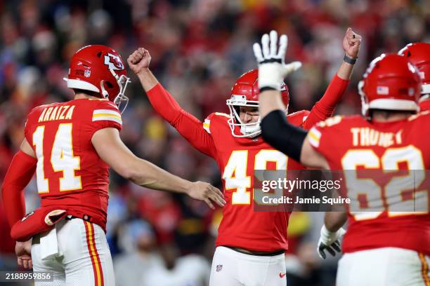 Matthew Wright of the Kansas City Chiefs celebrates the game winning field goal with Matt Araiza during the fourth quarter fala at GEHA Field at...