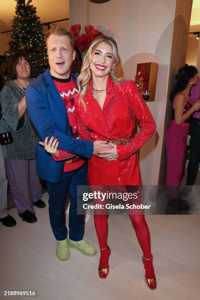 Oliver Pocher, Cathy Hummels during the Cathy Hummels Charity Christmas Event at Team 7 Flagship Store on December 12, 2024 in Munich, Germany.