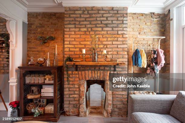 property interiors - brick fireplace stock pictures, royalty-free photos & images