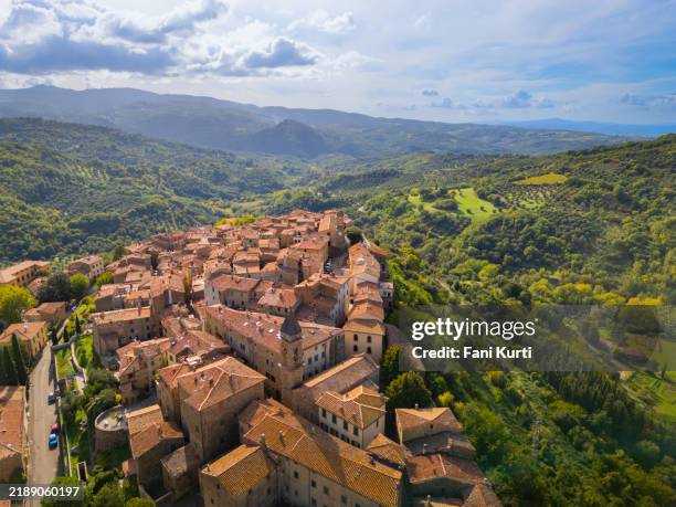 seggiano, tuscan medieval town from drone - stone house stock pictures, royalty-free photos & images