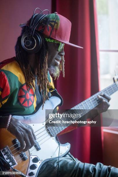 electric bass guitar practice - bass guitar stock pictures, royalty-free photos & images