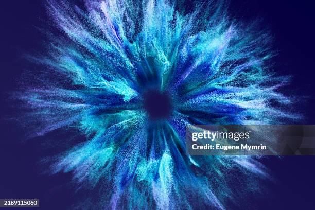colorful particles exploding from the center creating a futuristic effect - evolution concept stock pictures, royalty-free photos & images