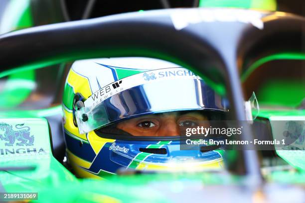 Gabriel Bortoleto of Brazil and Stake F1 Team Kick Sauber prepares to drive in the garage during Formula 1 testing at Yas Marina Circuit on December...