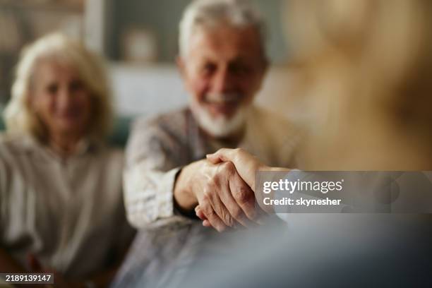 successful agreement with my insurance agent! - meet and greet stock pictures, royalty-free photos & images