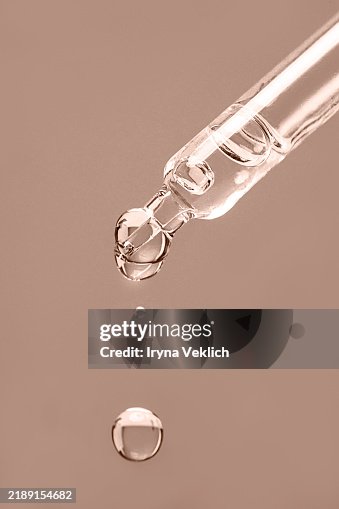 Natural Cosmetic and Liquid of Beauty Product for Body and Face Care Face Serum, Beauty Product Ampule in Glass Pipette with Drop and shadow in Beige Brown Mocha Mousse Color of The Year 2025. Natural Cosmetic and Liquid of Beauty Product for Body and Face Care Face Serum, Beauty Product Ampule in Glass Pipette with Drop and shadow in Beige Brown Mocha Mousse Color of The Year 2025.