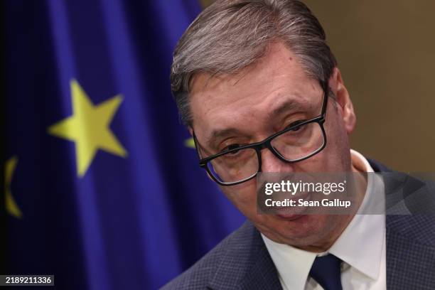 Serbian President Aleksandar Vucic and German Chancellor Olaf Scholz speak to the media following talks over lithium mining on December 10, 2024 in...