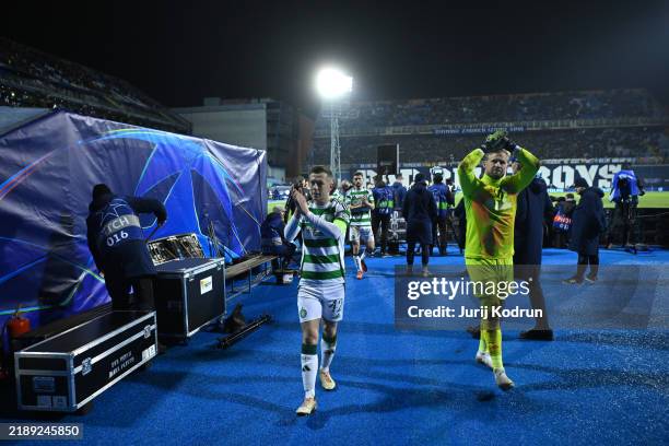 Callum McGregor and Kasper Schmeichel of Celtic shows appreciation to the fans during the UEFA Champions League 2024/25 League Phase MD6 match...
