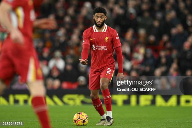 Liverpool's English defender Joe Gomez looks to play a pass during the English Premier League football match between Liverpool and Fulham at Anfield...