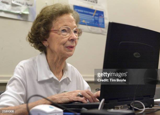 Year-old Suzette D'Hooghe works on her laptop computer during an "Introduction to Microsoft Word" computer class at the State of Illinois building...