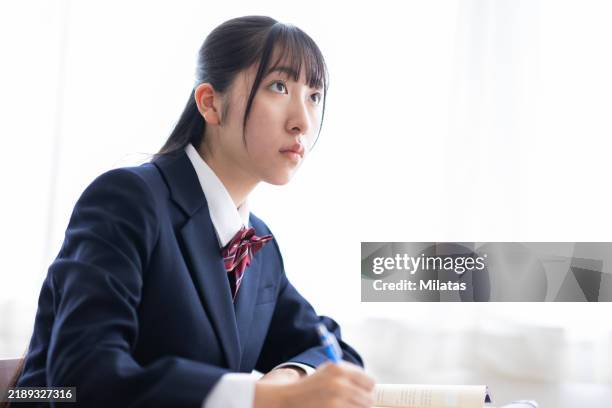 students taking classes at school - female high school student stock pictures, royalty-free photos & images