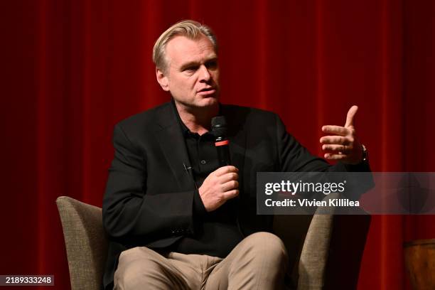 Christopher Nolan speaks onstage during a "Gladiator II" conversation with Director Ridley Scott and Director Christopher Nolan in Los Angeles at the...