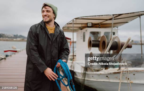 sailor preparing for his next trip - fisherman stock pictures, royalty-free photos & images