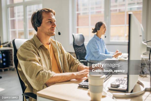 customer service call center with busy representatives - callcenter bildbanksfoton och bilder