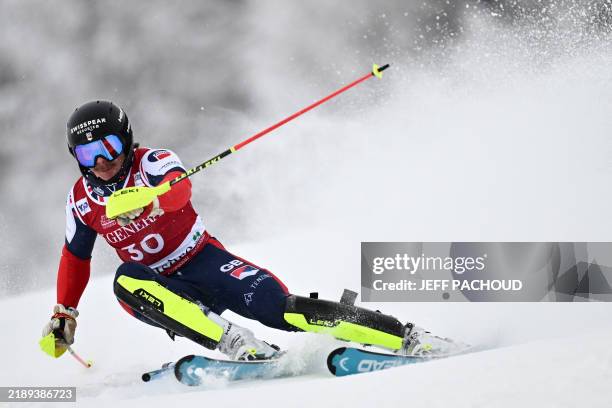 Britain's Laurie Taylor competes in the first run the men's Slalom of the FIS Alpine Skiing 2024/2025 World Cup event in Val-d'Isere, French Alps, on...