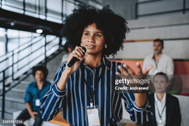 giving speaker presentation - presenter stock pictures, royalty-free photos & images