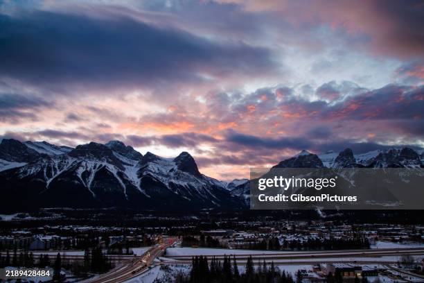 town of canmore in alberta, canada - dramatic sky night stock pictures, royalty-free photos & images