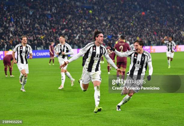 Dusan Vlahovic of Juventus celebrates scoring his team's first goal during the UEFA Champions League 2024/25 League Phase MD6 match between Juventus...